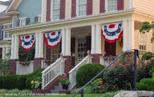 porches with patriotic appeal, curb appeal, outdoor living, patriotic decor ideas, seasonal holiday decor, A large stately porch decked out with multiple buntings