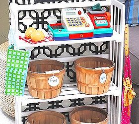 simple bookcase turned kids grocery store amp toy storage, diy, painted furniture, storage ideas, A sweet little pretend play grocery store with bushel baskets of food a cash register grocery bag and grocer s apron