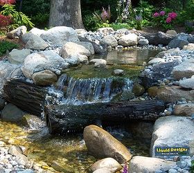 large pondless waterfall with strong water rushing through a split stream and over, curb appeal, outdoor living, ponds water features, Added 10 16 12 Finished project of gorgeous pondless waterfall