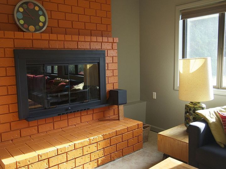 would you paint your brick fireplace a bold orange we did, fireplaces mantels, home decor, living room ideas, painting, and here s an After of the same spot