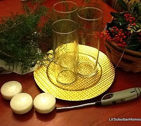 cheap chic christmas centerpiece, christmas decorations, crafts, seasonal holiday decor, The supply list for this project 3 cylinders 3 floating candles holiday greenery charger and a lighter of course