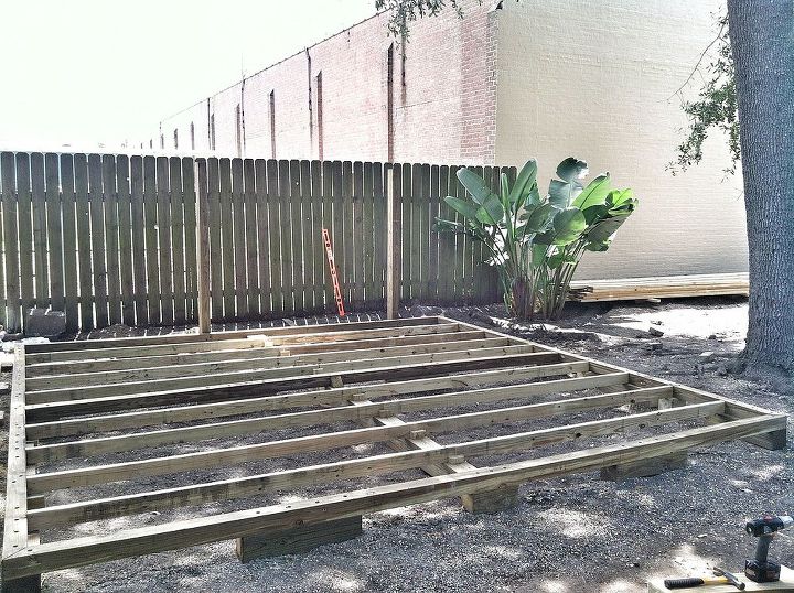backyard deck in new orleans, 6x6 support beam across bottom middle of frame 2x4s for support throughout frame