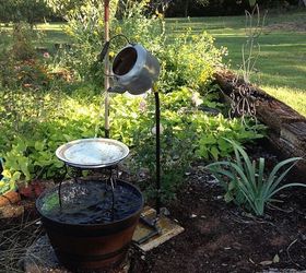 my hubby spent an hour at lowes figuring out how to make this i love it, flowers, gardening, outdoor living, repurposing upcycling, my kettle fountain my hubby made