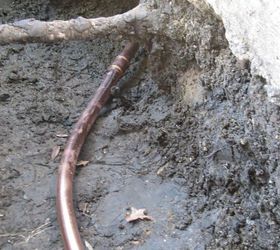 replaced main home water line with copper line, home maintenance repairs, how to, plumbing, Tie into city main line they had to come back the pvc line is my sprinkler system which they forgot to tie back in I showed this picture and they knew right where to dig to repair