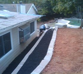 retaining walls, landscape, outdoor living, The extra dirt directs water from the neighbors around the house and downhill