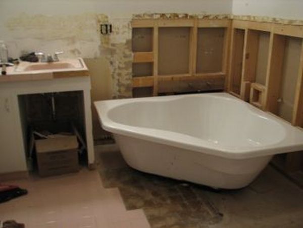 pink is evil according to my husband, bathroom ideas, tiling, A soaking corner bath tub The frame work was put in by a carpenter and the plumbing done by a professional plumber Not my metier