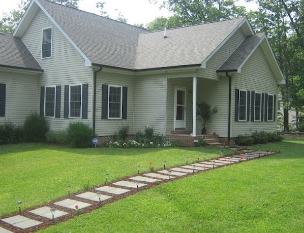 Front Walkway Built Out Of Inexpensive Cement Pavers Red Lava Rocks And Solar Lights Hometalk