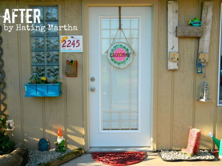 back porch, flowers, foyer, wreaths, Finding inexpensive ways to add life to a dull back entrance Spray a cheap rubber mat with a fun color A cheap dollar tray is painted and used for a welcome wreath A rubber mat filled with pea gravel is a drain mat