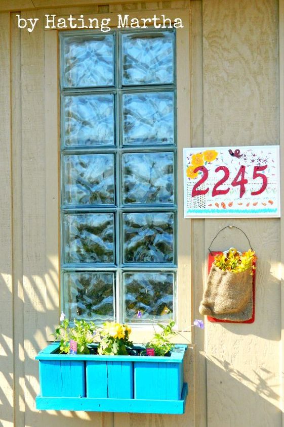 back porch, flowers, foyer, wreaths, a window box ready for the dump gets a new coat of paint and nails A clipboard and burlap bag works great to greet guests with flowers And a simple plaque and house numbers are painted to create a custom house plaque