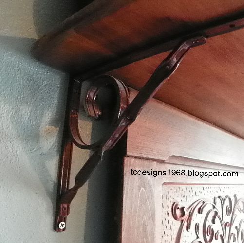 old piano remnants made into an art piece above the bed, repurposing upcycling, shelving ideas, I had some metal shelf holders lying around and the piece I used for the shelf fit perfectly I painted it Brown