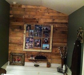  Pallet  wall in bathroom  with old window as picture frame 