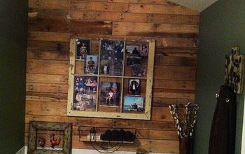 Pallet wall in bathroom with old window as picture frame!