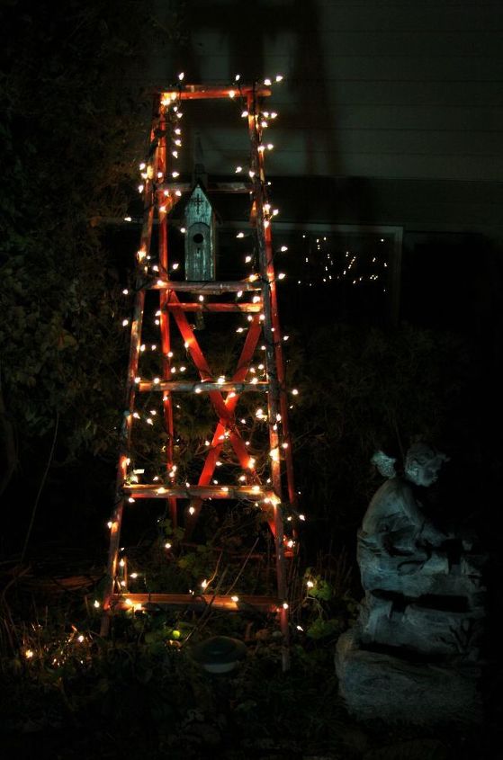 my outdoor decor this year, christmas decorations, repurposing upcycling, seasonal holiday decor, My Dad s old red ladder dressed up for Christmas