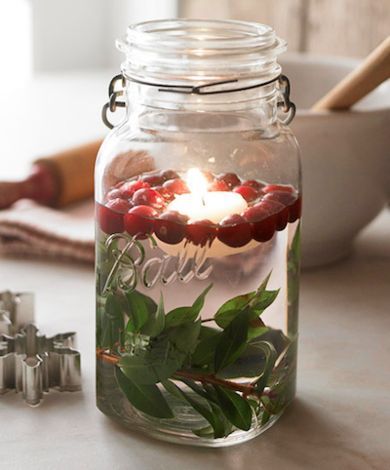 jingle all the way with 12 super easy diy holiday decorations with tutorial links, christmas decorations, crafts, home decor, mason jars, seasonal holiday decor, Mason jars have so many uses make your own candle illuminary with holiday berries and twigs