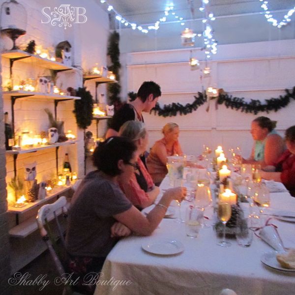 a woodland christmas, crafts, repurposing upcycling, seasonal holiday decor, A 3 metre long branch hanging from the ceiling supports hanging candles and fairy lights