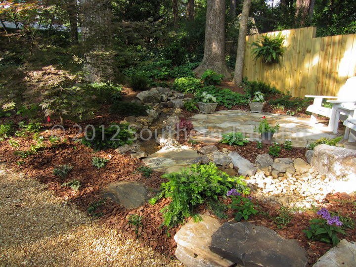transformation of the backyard for bird lovers, gardening, landscape, outdoor living, ponds water features, The newly installed sitting area with the pondless water feature