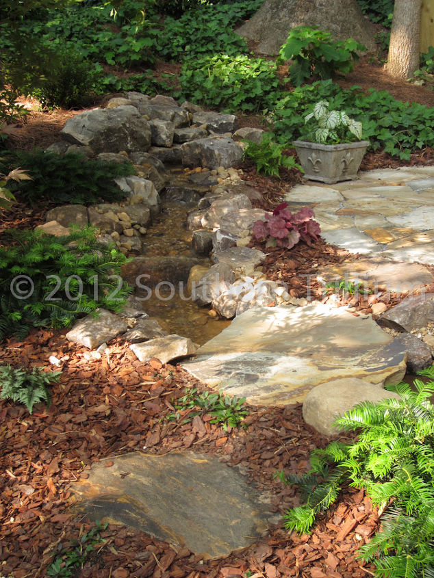 transformation of the backyard for bird lovers, gardening, landscape, outdoor living, ponds water features, A different view of the stream running along the sitting area