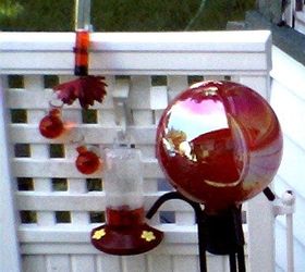 Garthering odd second hand or disguarded items and using them in a variety of ways, to add color and interest to my yard