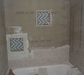 bathroom remodel, bathroom ideas, home improvement, In Process of tiling the tub surround with 2 inset shelves I taught my mother how to tile She and I did all the tile work ourselves