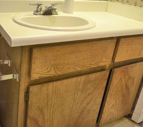 bathroom vanity makeover, bathroom ideas, countertops, woodworking projects, The bathroom vanity before with very old and disgusting apartment grade cabinet and laminate countertop