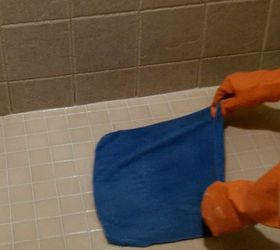 shower grout that doesn t stain or need sealed ever, bathroom ideas, home maintenance repairs, Drag a damp microfiber cloth across the tile surface to remove any haze