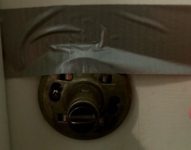 one simple fix that stops loose bathroom towel bars toilet paper holders and more, home maintenance repairs, Add a piece of duct tape to door handles to help keep them in place when you remove one screw at a time to add the 242 Blue