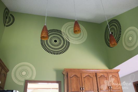 falling for these funky wheel wall stencil ideas, home decor, painting, wall decor, Funky Wheel Wall Design in the kitchen
