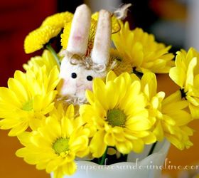 springtablescape for a kid friendly table, easter decorations, seasonal holiday d cor, I placed some fresh yellow flowers in a Thrift Store milk glass vase and tucked in a cloth bunny