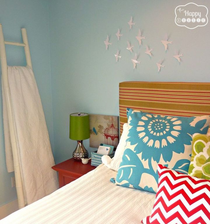 create a master bedroom you love on a budget, bedroom ideas, home decor, DIY Upholstered headboard bamboo ladder to store extra quilts tiny birds over headboard