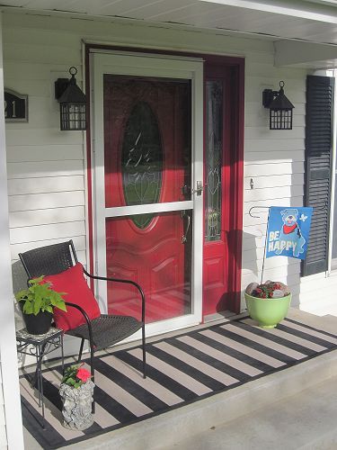an inexpensive spring porch makeover and diy painted outdoor rug, outdoor living, porches