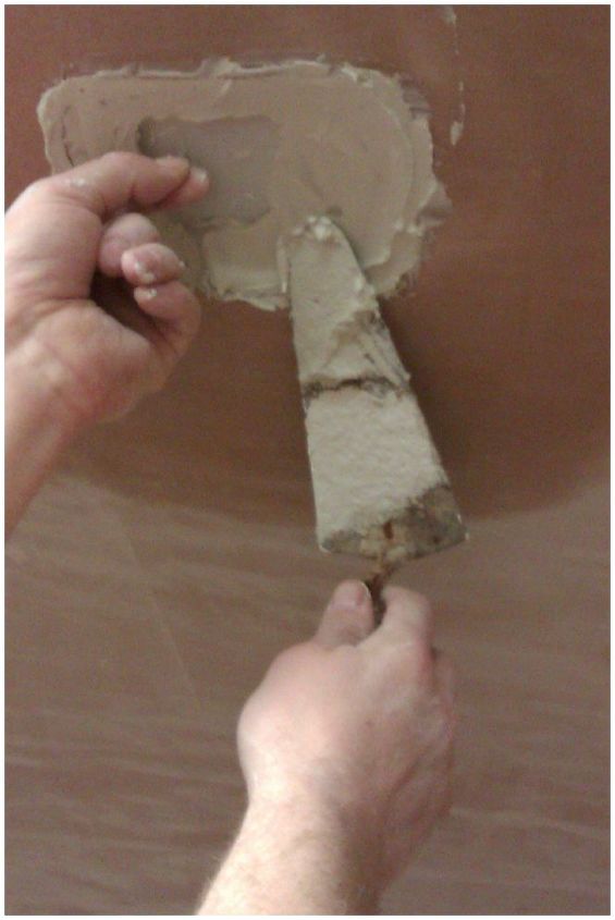 how to repair a small hole in your ceiling, The plasterboard piece is then pushed through the ceiling area and pulled into position using the nail the surplus drywall adhesive is then used to start filling in the ceiling patch