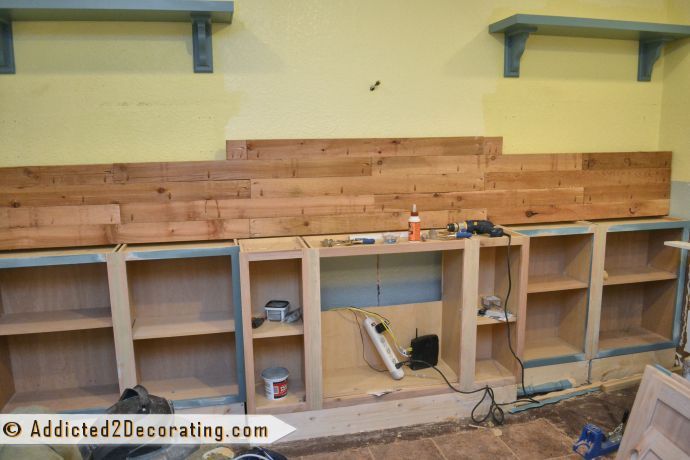 diy bookcase media wall, diy, painted furniture, shelving ideas, woodworking projects, I made the countertop out of cedar 2 x 4 s using a Kreg Jig The countertop is 12 feet long so I built it in place All of the pocket holes are on the bottom so the top is perfectly smooth