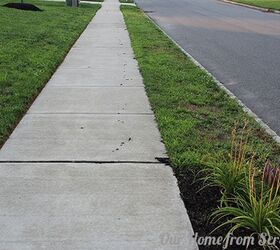 protecting mulch beds with a stone perimeter, concrete masonry, diy, flowers, gardening, To add insult to injury the mulch leaves a trail down the sidewalk towards the low point drain on the street which I need to clean up afterwards