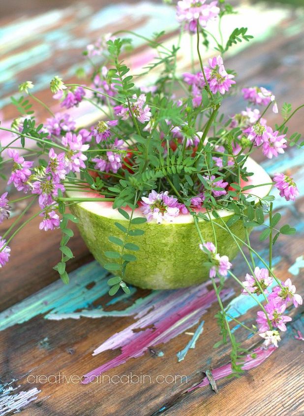 watermelon vase, flowers, gardening, Chippy painted table with a watermelon rind filled with lavender and hot pink flowers
