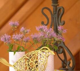 white slipcovers and wildflowers, home decor, painted furniture, Tin cans with craft paper wrapped around them and filled with wild beebalm