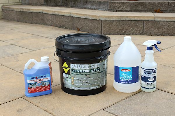 stone patio care 3 tips to keep your outdoor oasis clean all summer, home maintenance repairs, how to, patio, Wet Forget Polymeric Sand and White vinegar will help keep your patio looking great all summe long