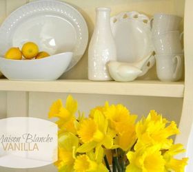 fresh look for my hutch, painted furniture, Several shades of white dishes and a few pops of yellow for Easter are sitting pretty on my hutch and making my dining room a much brighter and happier space