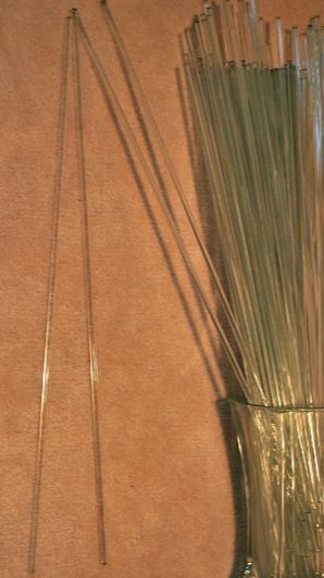 i need ideas what to do with these glass rods, Each rod is 2 feet long with blunt round top and bottom But I assume quite breakable