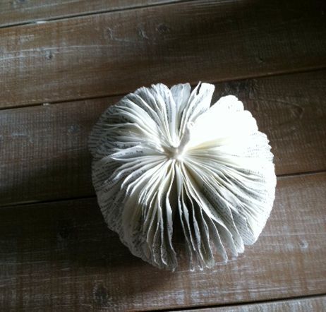 diy paper book pumpkins, crafts, repurposing upcycling, seasonal holiday decor, I went through each page and crinkled it just a tad to help keep it separated from the other pages Here is my pumpkin all fluffed and crinkled