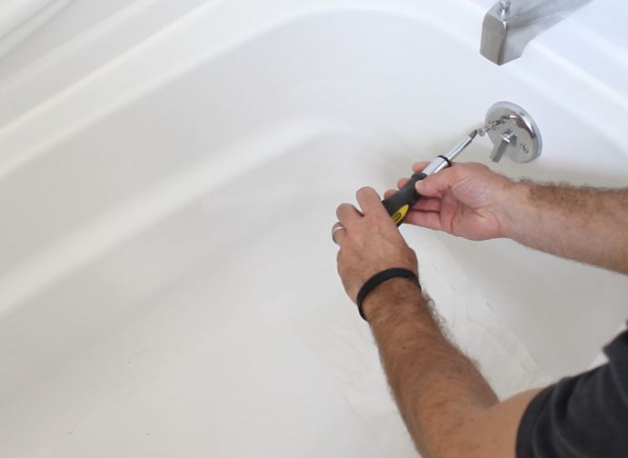 how to unclog a bathtub drain the easy way, bathroom ideas, cleaning tips, home maintenance repairs, how to, plumbing, Remove the overflow cover plate