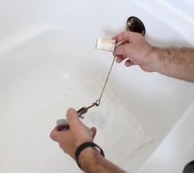 how to unclog a bathtub drain the easy way, bathroom ideas, cleaning tips, home maintenance repairs, how to, plumbing, Check the plunger for hair and debris