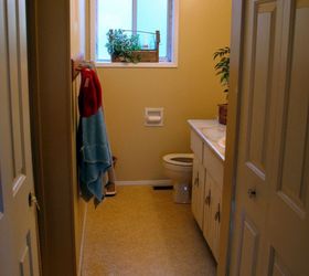 a bathroom makeover minus mr big honkin vanity, bathroom ideas, painting, repurposing upcycling, small bathroom ideas, You have to see the before See that vanity It took up half the room Ever try changing in a closet Wait a yellowed yellow closet Yeah That