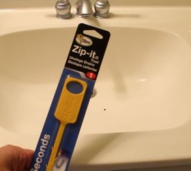 how to unclog a sink like a pro, bathroom ideas, cleaning tips, diy, how to, plumbing, Use a 3 Zip It to remove debris from the sink drain