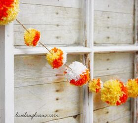 rustic halloween vignette, crafts, halloween decorations, repurposing upcycling, seasonal holiday decor, One of the handmade pieces used in the vignette were these candy corn pom poms Super fun