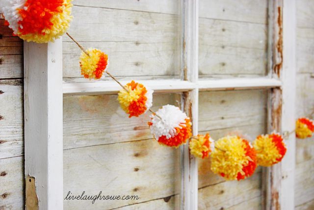 rustic halloween vignette, crafts, halloween decorations, repurposing upcycling, seasonal holiday decor, One of the handmade pieces used in the vignette were these candy corn pom poms Super fun