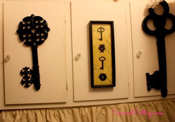 laundry room makeover, home decor, laundry rooms, I love old keys and painted these black and added the framed art for 14 found at thrift stores