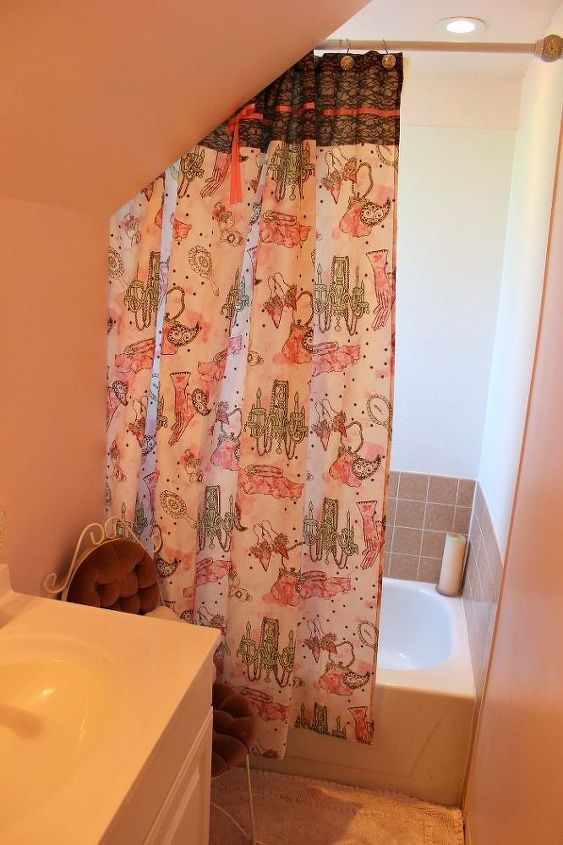 our updated pink powder room, bathroom ideas, paint colors, painting, wall decor, We tied in the older brown tile with the pink walls with a pretty shower curtain