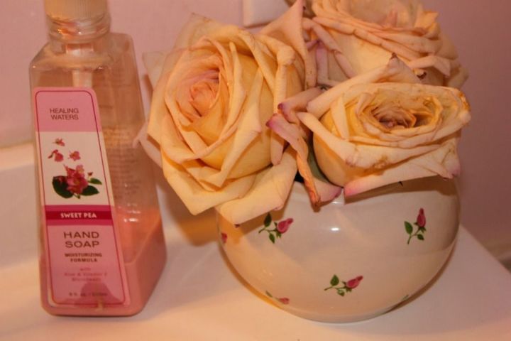 our updated pink powder room, bathroom ideas, paint colors, painting, wall decor, We added pretty pink roses and accessories