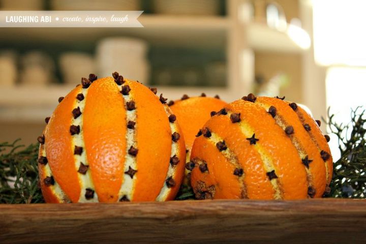 clove studded oranges for christmas, christmas decorations, seasonal holiday decor
