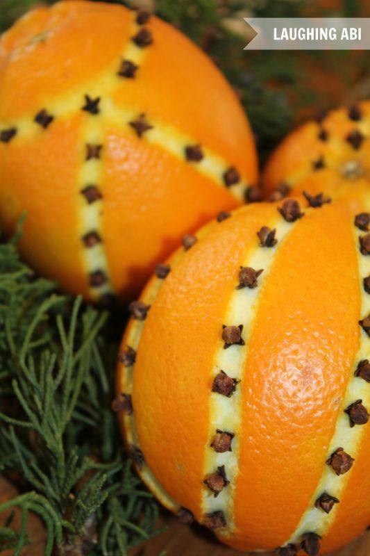clove studded oranges for christmas, christmas decorations, seasonal holiday decor